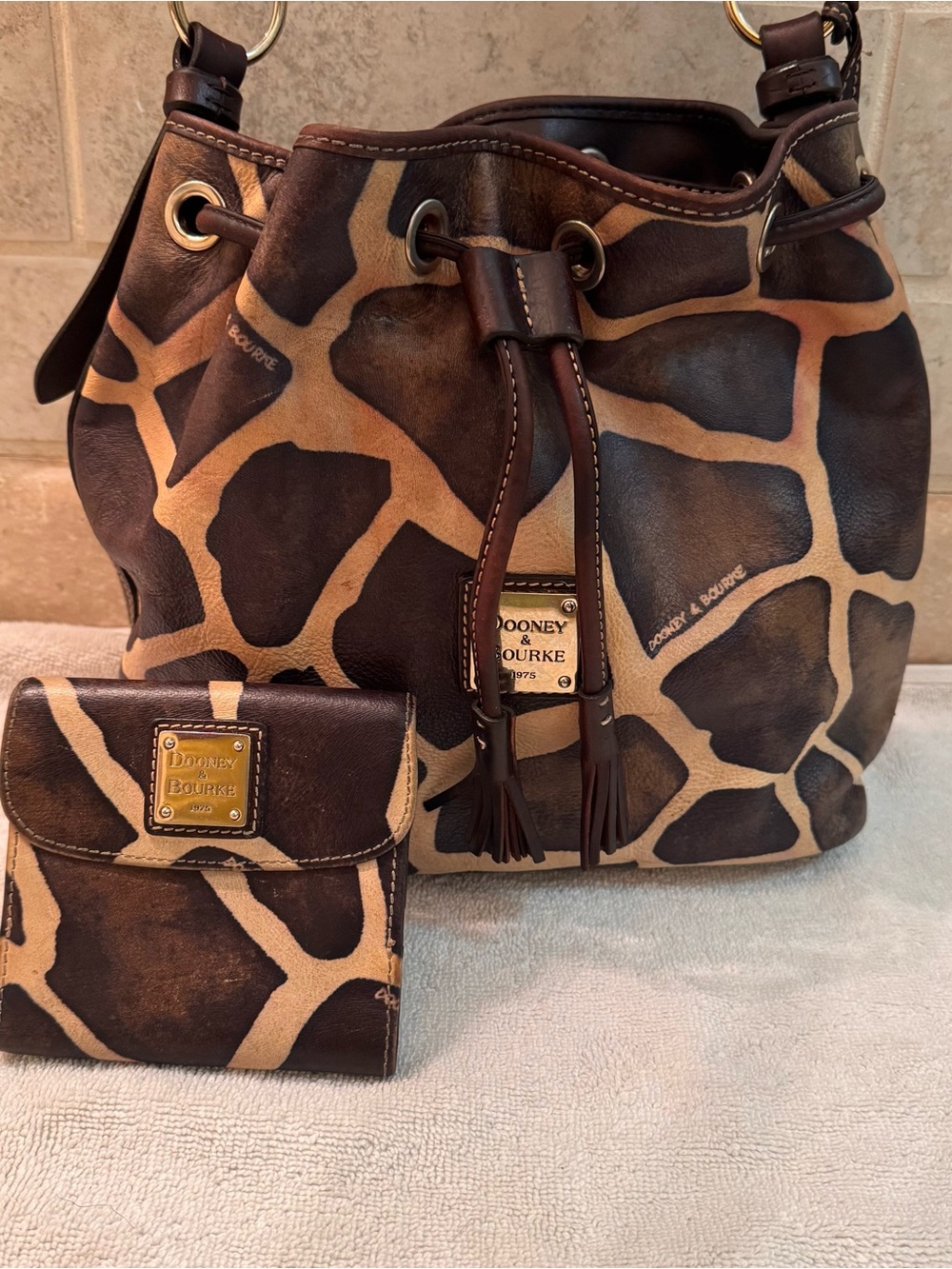 Dooney & Bourke Giraffe-Print Drawstring Shoulder Bag in Brown and Tan